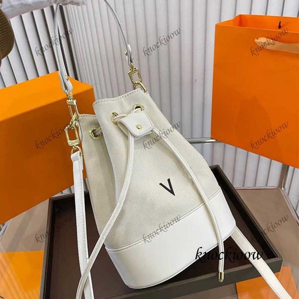 

designer simple bucket bag bag body canvas and leather combination, lightweight and versatile, detachable handbag, can be handheld crossbody