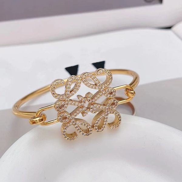

gold full diamond irregular fashion luxury designer bracelet, Black