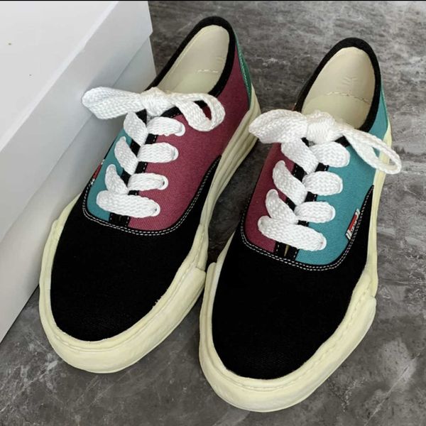 

co branded maison mihara yasuhiro dissolved shoes mmy men's and women's canvas shoes thick sole low classic pure black and white b