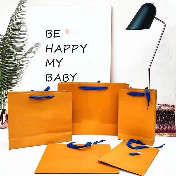 

luxury bag, yellow portable paper bag, clothing storage paper bag