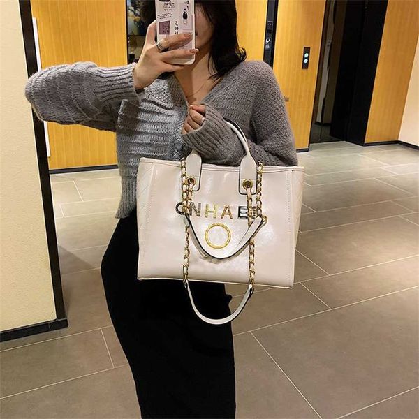 

luxury classic handbags beach bags brand metal badge tote bag small evening handbag female capacity large leather one shoulder backpack ap9