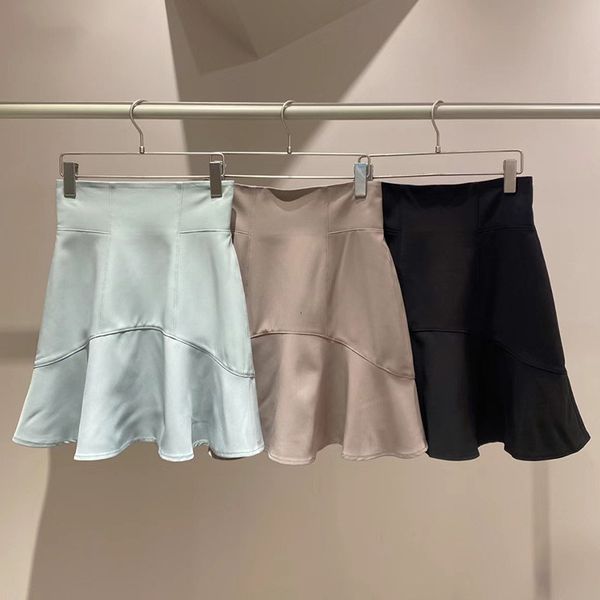 

skirts kuzuwata high waist solid color hip package jupe japanese faldas mujer moda with safety shorts ruffles slim mini skirt 230506, Black