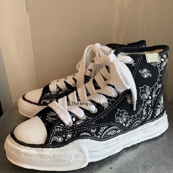 

co branded mmy dissolving maison mihara yasuhiro cashew flower thick soled men's board shoes women's high rise low black deformati