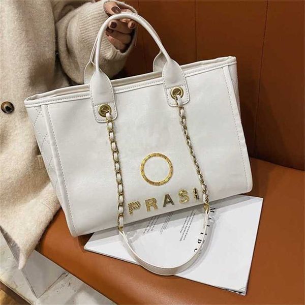 

luxury brand handbags evening bags metal badge tote bag small fashion beach handbag female capacity large leather one shoulder backpack fact