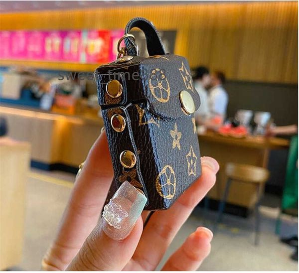 

fashion designer airpods case keychains trinkets pu leather key rings chains jewelry brown flower pendant bag charms keyrings car keys holde, Slivery;golden