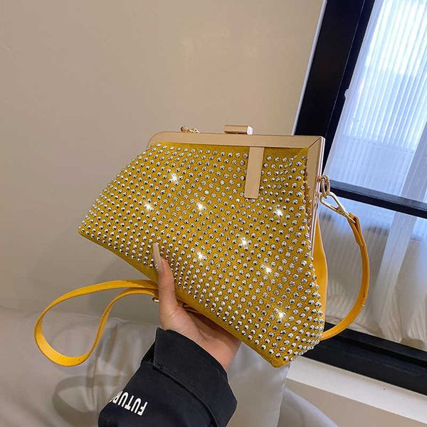 

2023 fashion handbag new personalized chain single shoulder oblique straddle small fashionable and fresh handbag diamond clip handle dinner
