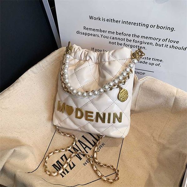 

20% off 2023 fashion handbag spring/summer new mini garbage for children's parent-child phone cross carrying pearl wrist bag