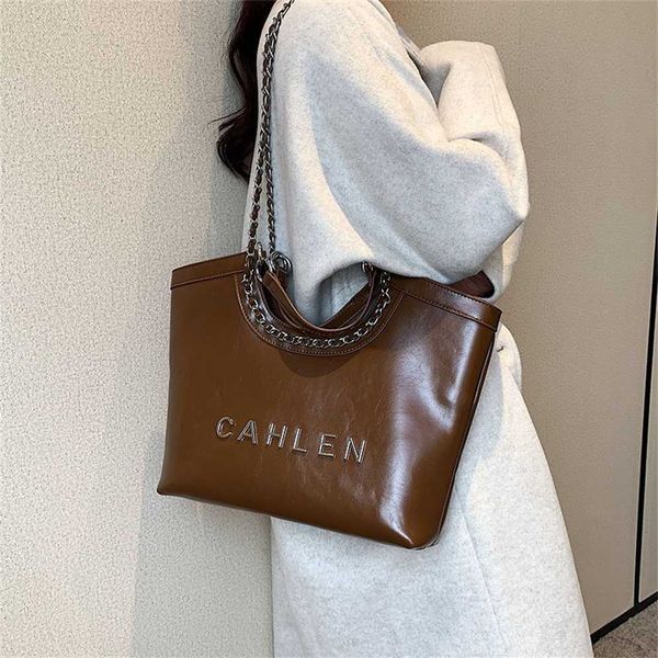 

purses textured large capacity bag autumn and winter new women's fashion commuting shoulder handheld tote