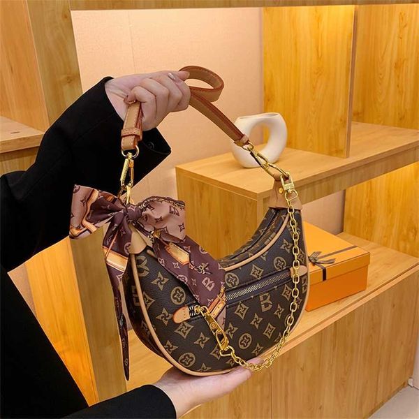 

50% off factory online light luxury old flower chain underarm bag leisure pea new crossbody women's single shoulder versatile crescent