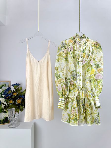 

runway dresses 2023 australian designer designs a new unique eden collection eden ruffled floral print mini dress for spring and summer, Black