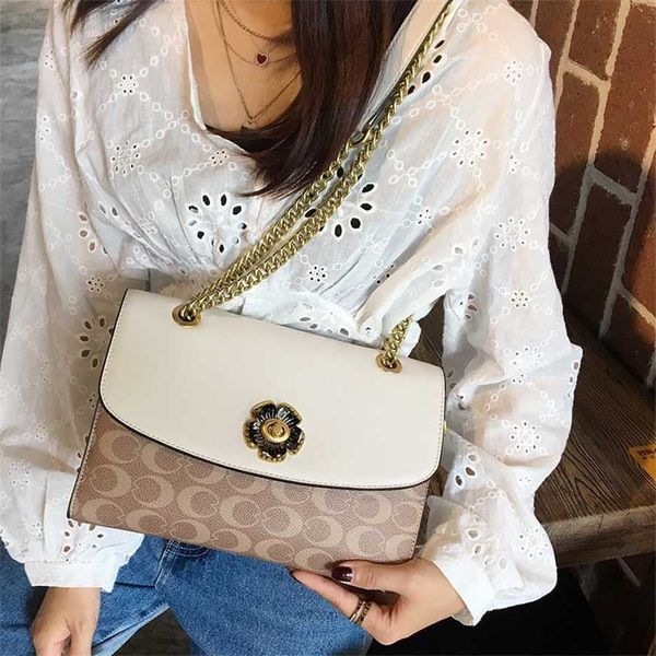 

50% off factory online 2023 new fashion light luxury camellia chain women's bag leather one shoulder crossbody handheld