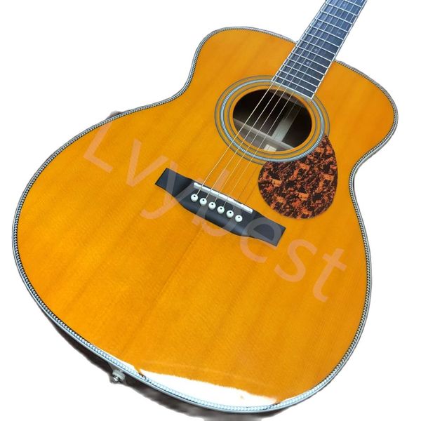 

lvy40 "om42 face yellow 40" ballad refers to playing bakelite guitar