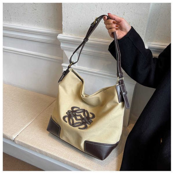 

2023 fashion handbag new spring/summer high capacity premium canvas lazy leisure shopping small one shoulder tote bag