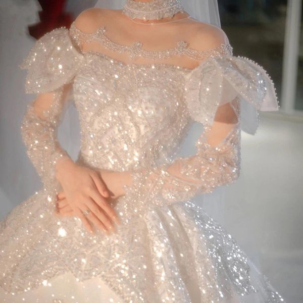 

luxury long sleeve wedding dresses beading sequined detachable sleeve illusion o neck shinning gorgeous bridal gowns sweep train 2023, White