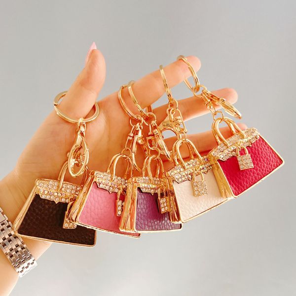 

fashion creative keychains for woman upscale exquisite alloy rhinestone leather luxury handbag key chain designer car key ring pendant, Silver