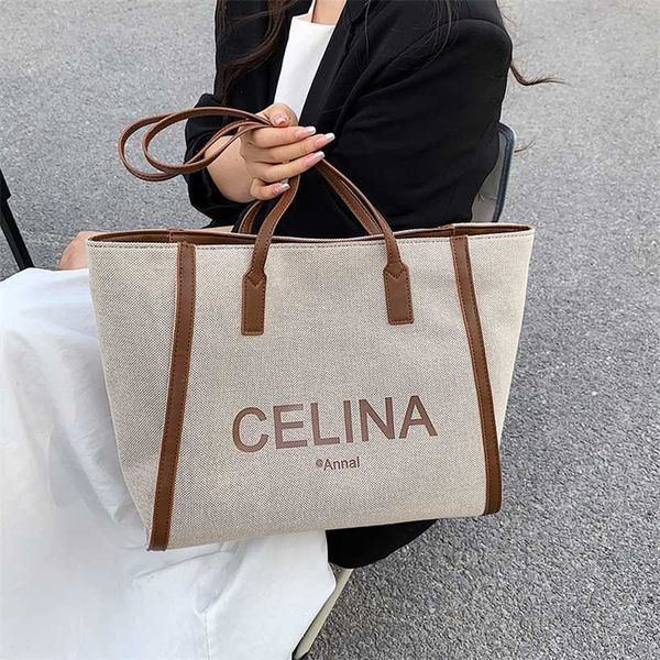 

16% off 2023 handbag large capacity canvas for women new printed letter textured shoulder with small design fashion tote bag
