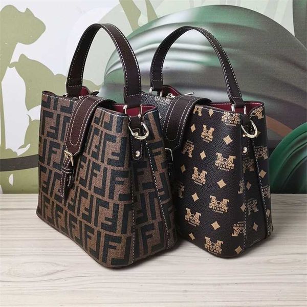 

16% off 2023 fashion handbag popular genuine leather quality printed bucket women's large capacity crossbody mesh red shoulder bag kore