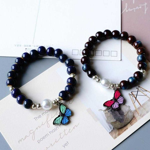 

elegant girlfriends high grade ceramic bracelet female special interest design blue pearl butterfly ornament, Golden;silver