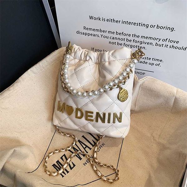 

18% off 2023 fashion handbag spring/summer new mini garbage for children's parent-child phone cross carrying pearl wrist bag