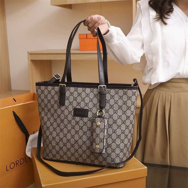 

18% off 2023 fashion hand women's diagonal cross niche tote large capacity portable texture fashionable shoulder bag