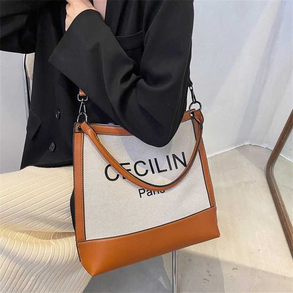 

16% off 2023 handbag tote women's autumn new canvas one shoulder underarm urban minimalist fashion letter hand carrying crossbody bag