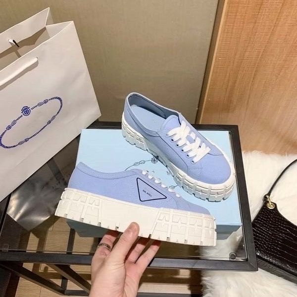 

casual canvas shoe men women shoes rubber platform inspired by motocross tires defines unusual design of these nylon gabardine logo triangle, Black