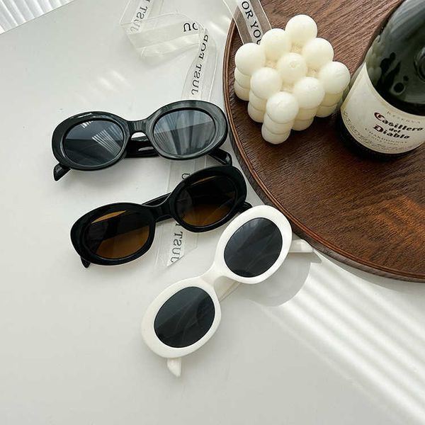 

new oval shaped children's sunglasses are popular on the internet fashionable and colorful baby cute trendy for boys girls, White;black