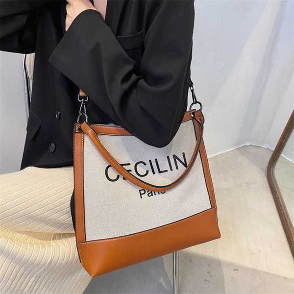 

23% 2023 handbag tote women's autumn new canvas one shoulder underarm urban minimalist fashion letter hand carrying crossbody bag