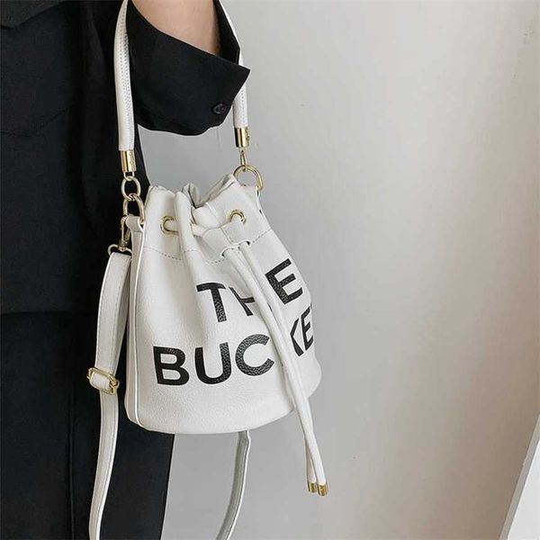 

23% 2023 handbag autumn/winter textured one shoulder crossbody women's handheld fashion letter bucket bag new trend