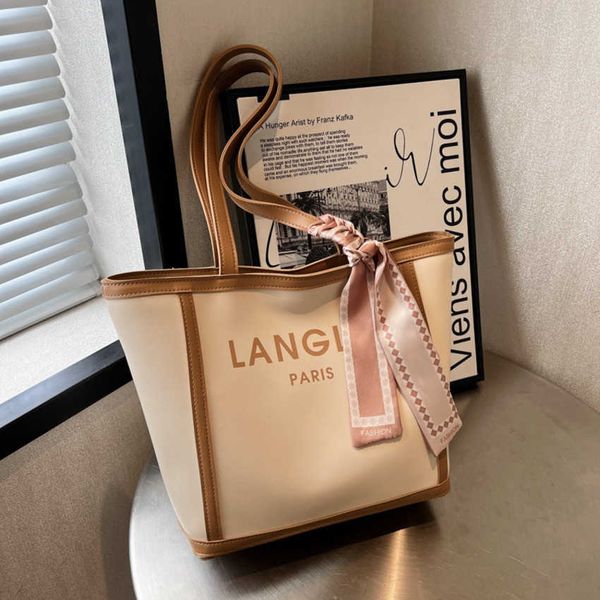 

50% off 2023 fashion hand daily commuting to work large capacity tote for women new high-end feeling shoulder fashionable and versatile unde