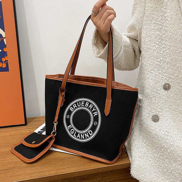 

2023 fashion handbag women's commuter vogue canvas tote small design large capacity art print letter one shoulder underarm bag