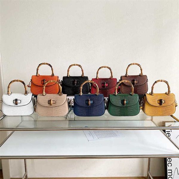 

17% off 2023 fashion handbag summer crocodile bamboo high grade small bun women's leather handheld straddle saddle bag