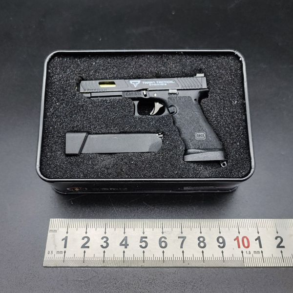 

g34 gun tti speed chasing shell ejection pistol alloy miniature toy gun keychain survival pistol model detachable bullet throwing 2082