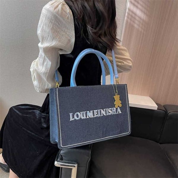 

17% off 2023 fashion handbag women's small and high class hand tote new denim personalized embroidered letter one shoulder crossbody ba