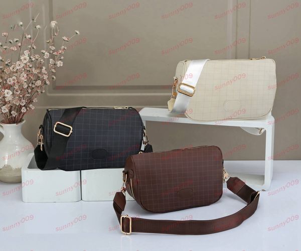 

black brown white embossed grid crossbody bag with bottom zipper pocket design luxury wash gargle bags designer aslant bag wallet