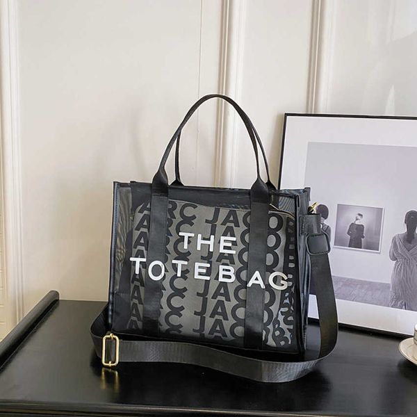 

50% off 2023 fashion handbag women's summer new letter printing mesh handheld one shoulder crossbody foreign style tote bag