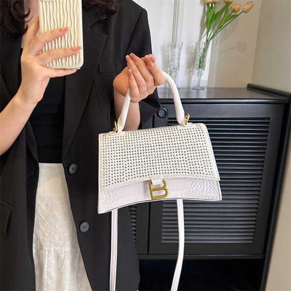 

32% 2023 fashion handbag women's hourglass bag single shoulder sticker diamond handheld patent leather advanced splice new