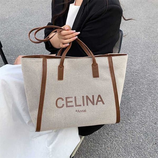 

21% off 2023 handbag large capacity canvas for women new printed letter textured shoulder with small design fashion tote bag