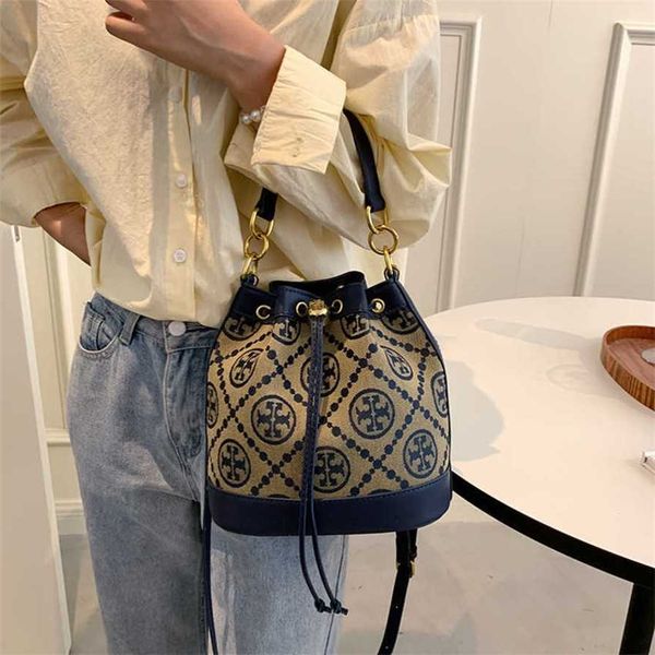 

17% off 2023 fashion handbag bucket women's new old flower drawstring shoulder bag contrast color trendy canvas oblique straddle handba