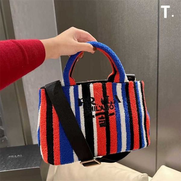 

32% 2023 fashion hand p family niche tote stripe fashion portable large capacity woolen versatile crossbody women's bag