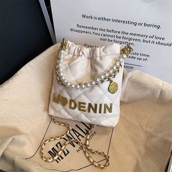 

19% off 2023 fashion handbag spring/summer new mini garbage for children's parent-child phone cross carrying pearl wrist bag