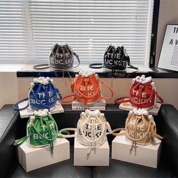 

30% off 2023 fashion handbag net red same little popular design lamb hair letter handheld bucket female autumn winter korean one shoulder cr