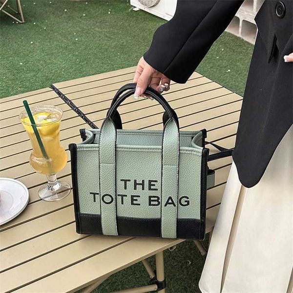 

13% off 2023 fashion handbag tote women's new trendy and fashionable handbag small crowd contrast printing letter oblique straddle bag