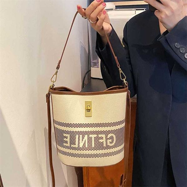 

21% off 2023 fashion handbag bucket women's summer new canvas handbag small and high end printed letter one shoulder crossbody bag