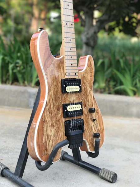 

special shaped log color, headless electric guitar, good customization quality