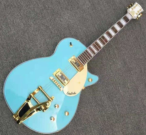 

performing electric guitar, new blue, tremolo system factory customization