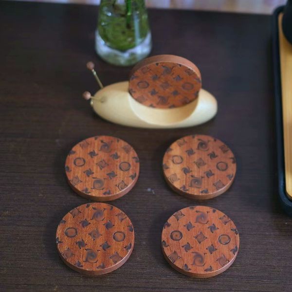 

ilivi monogram handcrafted handmade wooden snail coasters collectable black walnut coffee tea cup mats natural non slip teapot drink coaster