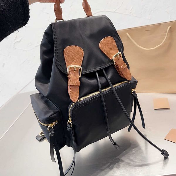

great quality 2023 new women's waterproof nylon fabric bags all-season black traveling and hiking large capacity backpack unisex
