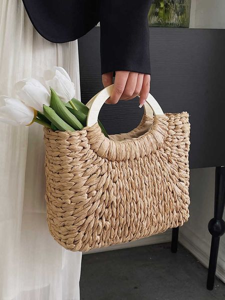 

2023 summer handwoven womens tote bag vacation beach handbags for women vintage hollow out rattan basket 230512