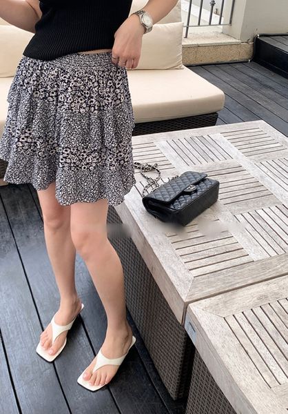 

skirts fashion designer designs the latest layered pleated floral half skirt for spring/summer 2023, Black